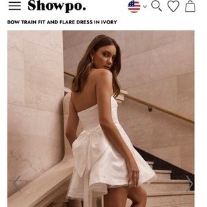 SHOWPO CAILENE MINI DRESS - STRAPLESS BOW TRAIN FIT AND FLARE DRESS IN IVORY
